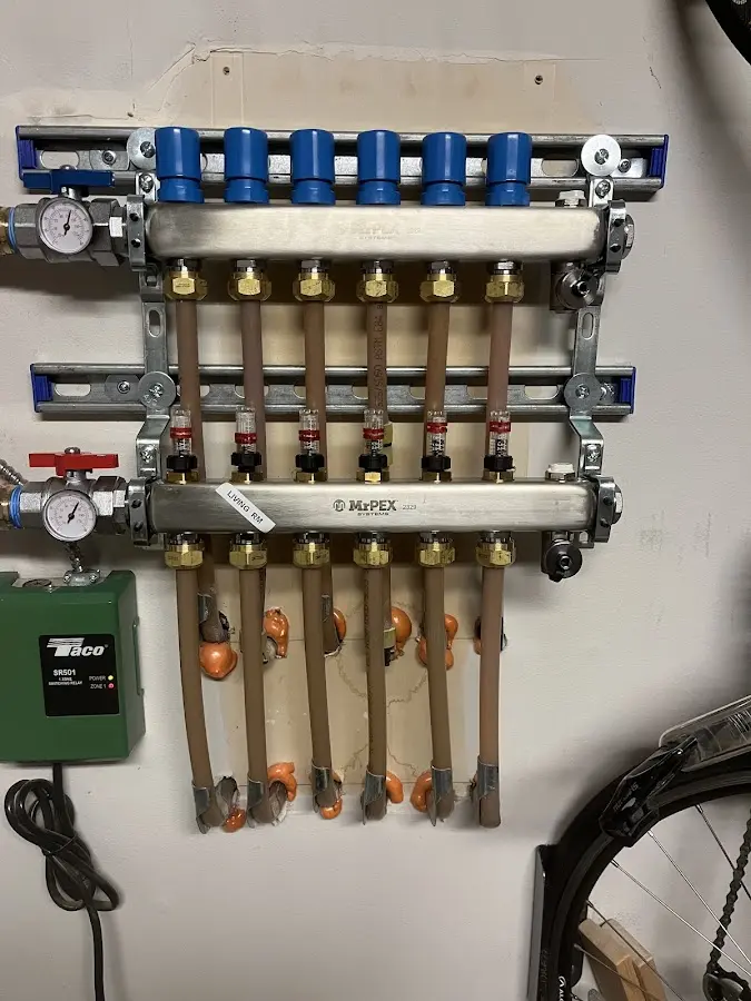 Plumber performing Gas Line Installation at a residential property in New Brighton